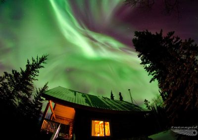 Aurora Borealis above a cabin